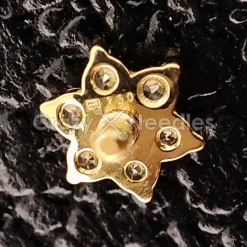 Nakrętka złoto 18K - złoty kwiat z morskimi cyrkoniami - GD18K-002