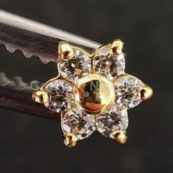 Nakrętka złoto 18K - złoty kwiat z białymi cyrkoniami - GD18K-002