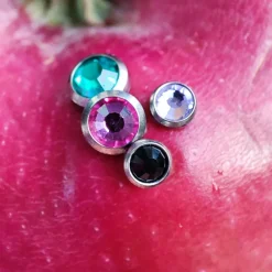 Tytanowa nakrętka Dermal różowa cyrkonia - TNA-011