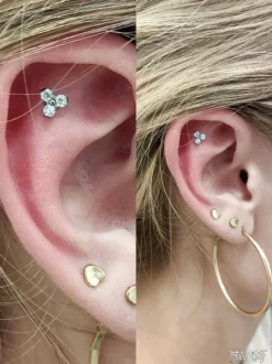 Tytanowy kolczyk labret z trzema białymi cyrkoniami